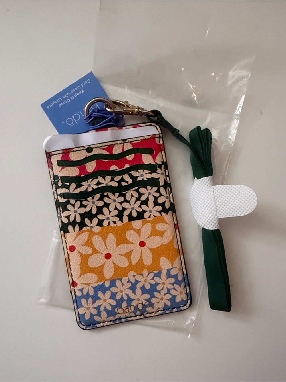 ban.do Floral Stripe Card & Lanyard Holder — Yellow, Blue, Green, Red, White